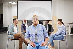 Woman Posing in Group Therapy