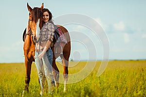 Woman posing with horse