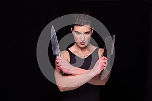 Woman posing with knives
