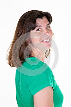 Woman posing middle aged in side portrait view on white background