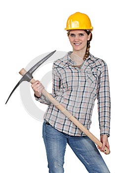 Woman posing with pick-axe