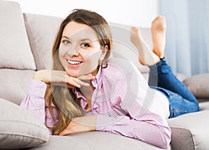 Woman posing playfully indoors