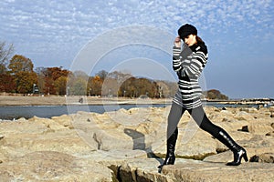 Woman posing on the rocks