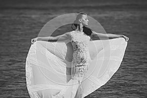 Woman posing on sea beach