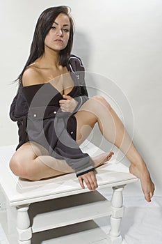 Woman posing on table top