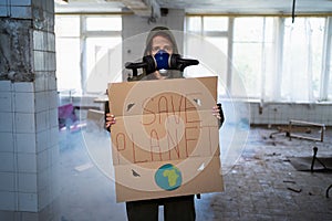 Woman post apocalyptic survivor with gas mask surrounded by smoke with banner save planet. Global catastrophe. pandemic