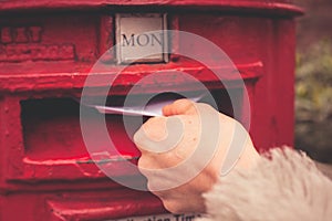 Woman posting letter