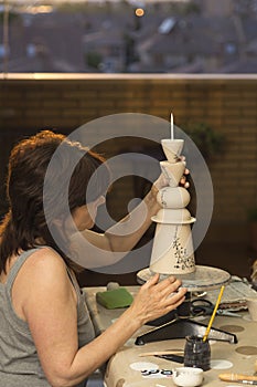 Woman potter in the studio