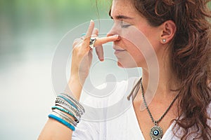 Woman practice yoga breathing techniques outdoor photo