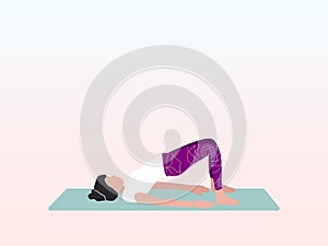 A woman practices yoga in the bridge pose or Setu Bandha Sarvangasana. Helps stretch neck and spine and calm the mind.