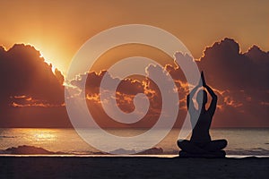 Woman practices yoga and meditation on the beach at sunset, generative AI