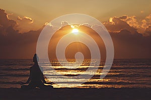 Woman practices yoga and meditation on the beach at sunset, generative AI