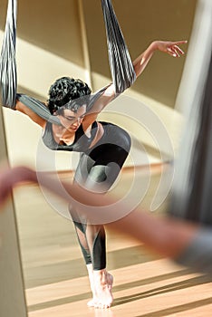 Woman practicing acrobatic aerial dance