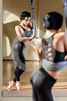 Woman practicing acrobatic aerial dance