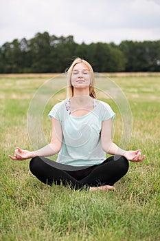 Woman practicing meditation for wellbeing