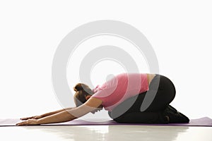 Woman practicing yoga. photo
