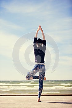 Woman practicing yoga