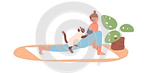 Woman practicing yoga exercise with cute cat at home. Happy person doing stretching workout with pet. Young female