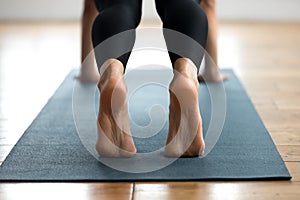 Woman practicing yoga, Plank pose close up
