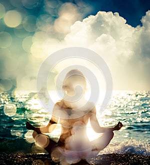 Woman Practicing Yoga by the Sea. Bokeh Background