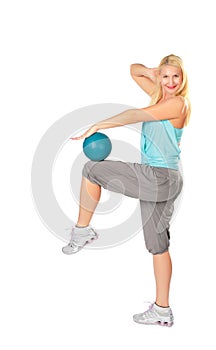Woman practises with blue ball