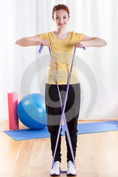 Woman practising arm muscles