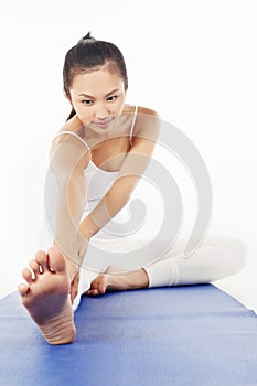 Woman practising yoga. Conceptual image