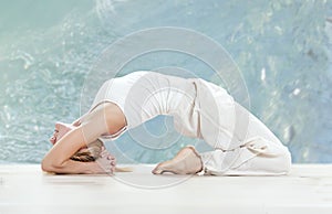 Woman practising yoga exercise