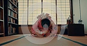 Woman, prayer and Japanese or spiritual religion in tatami room for tradition culture, respect or ritual. Asian person