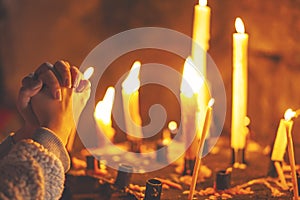 Woman praying in church photo