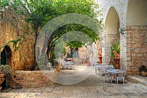 Woman praying in Monastery of Holy Cross near Jerusalem, Israel.