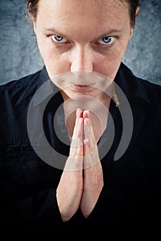 Woman praying and praising the God photo