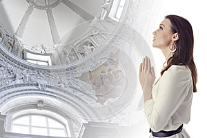 Woman praying in a temple