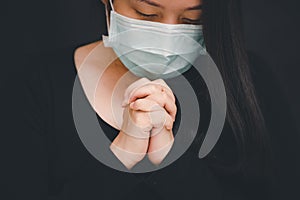 Woman praying and worship to GOD Using hands to pray in religious beliefs and worship christian in the church or in general