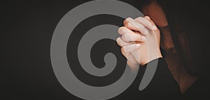 Woman praying and worship to GOD Using hands to pray in religious beliefs and worship christian in the church or in general