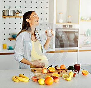 woman pregnant food healthy juice fruit kitchen pregnancy resh diet mother preparing drink smoothie breakfast