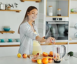 woman pregnant food healthy juice fruit kitchen pregnancy resh diet mother preparing drink smoothie breakfast