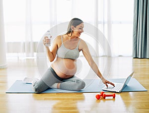 woman pregnant mother pregnancy female exercise sport fitness belly healthy maternity motherhood health yoga young