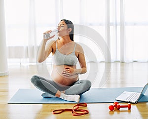 woman pregnant mother pregnancy female exercise sport fitness belly healthy maternity motherhood health yoga young