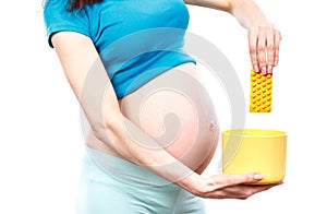 Woman in pregnant throwing medical pills, reduction of using tablets in pregnancy