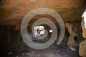 Woman in prehistoric cave