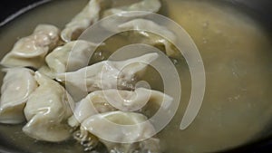 Woman prepare severing chinese dumpling