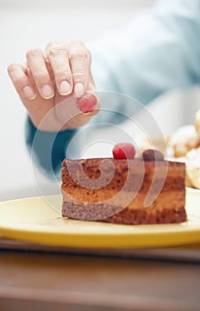 Woman preparing chocolate cake