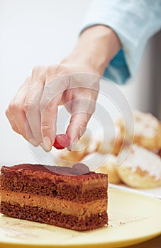 Woman preparing chocolate cake