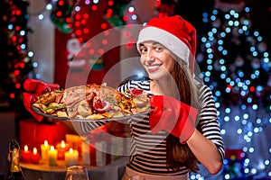 Woman preparing for Christmas dinner