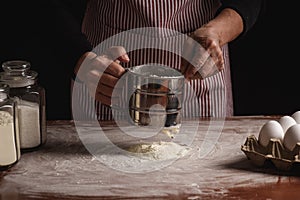 Woman preparing dough with her hands
