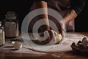 Woman preparing dough with her hands