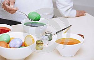 Woman preparing Easter eggs
