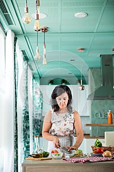 Woman preparing a gazpacho