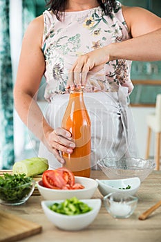 Woman preparing a gazpacho